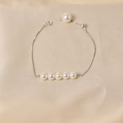 Silver Caps Pearl Bracelet